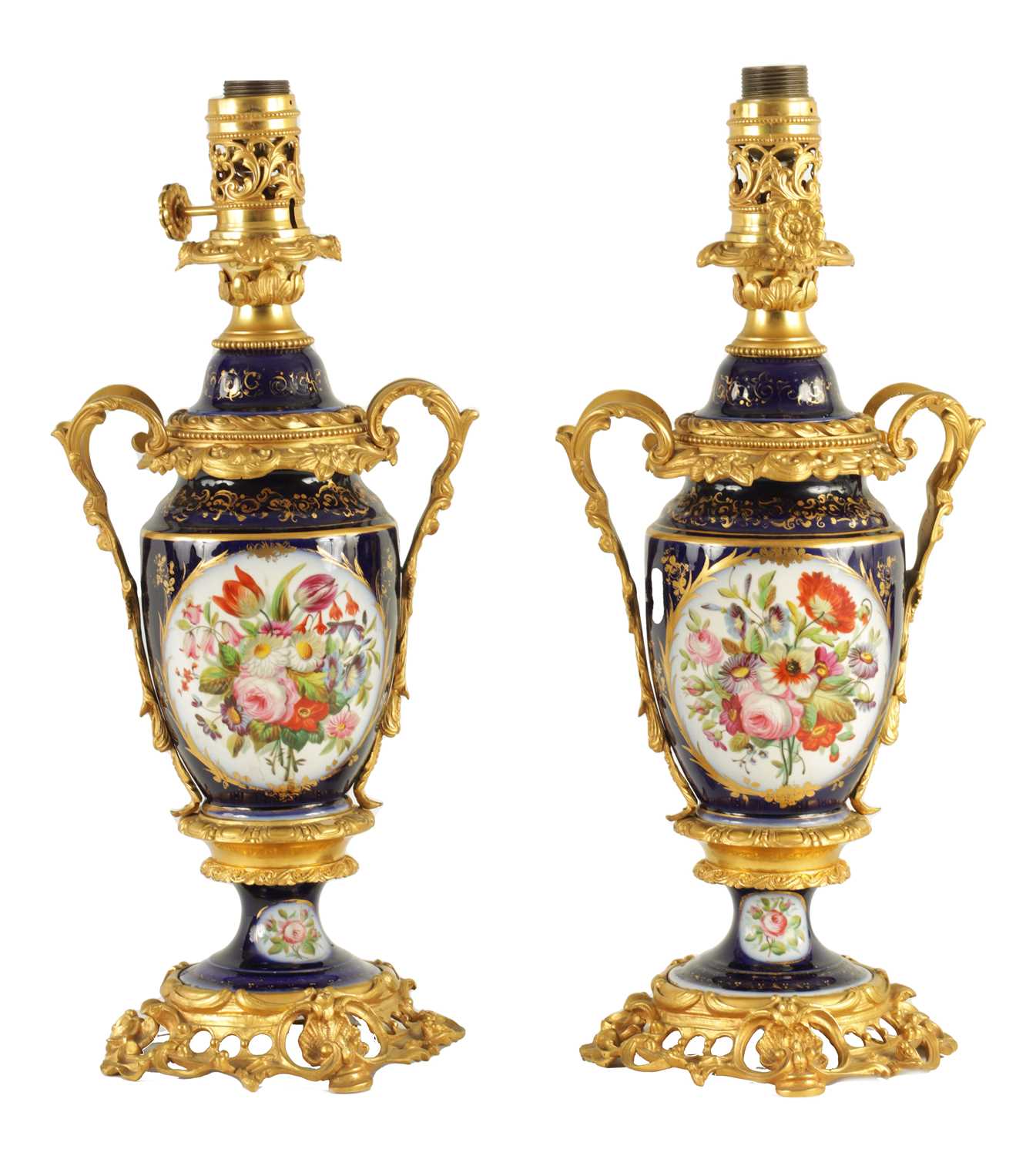 A PAIR OF 19TH CENTURY CONTINENTAL ORMOLU MOUNTED PORCELAIN LAMP BASES