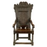 A 17TH CENTURY OAK WAINSCOT CHAIR