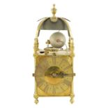 A RARE EARLY 18TH CENTURY BRASS QUARTER STRIKING SINGLE HANDED VERGE LANTERN CLOCK