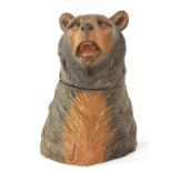 A LATE 19TH CENTURY BLACK FOREST CARVED BEARS HEAD TABACCO JAR