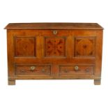 AN EARLY 18TH CENTURY WELSH INLAID JOINED OAK MARRIAGE CHEST
