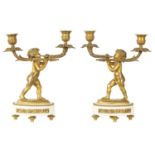 A PAIR OF 19TH CENTURY FRENCH ORMOLU AND WHITE MARBLE FIGURAL CANDELABRA