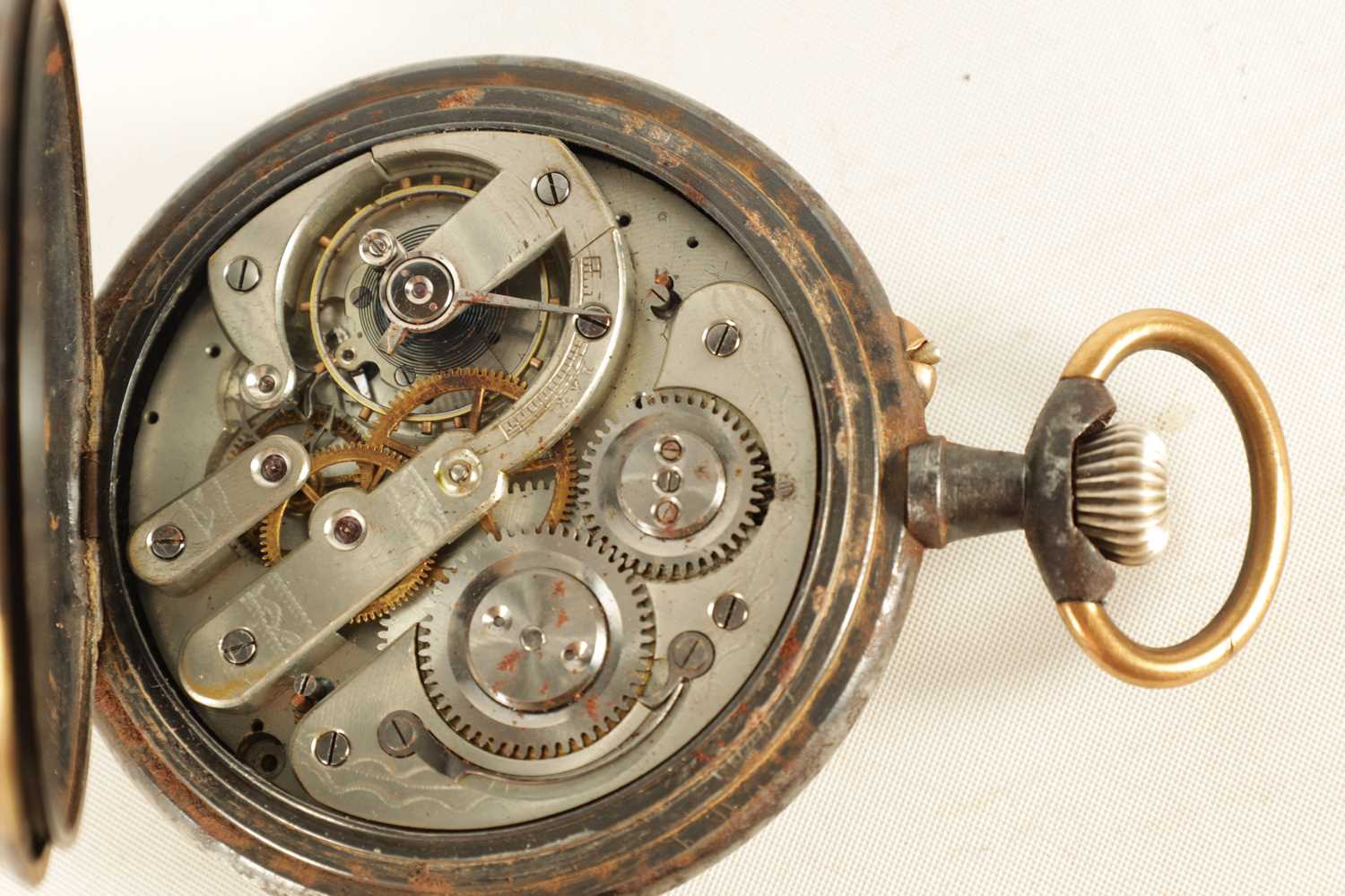 A LARGE EARLY 20TH CENTURY GUN METAL AND GILT DIAL MOON PHASE CALENDAR POCKET WATCH WITH INTERESTING - Image 2 of 4