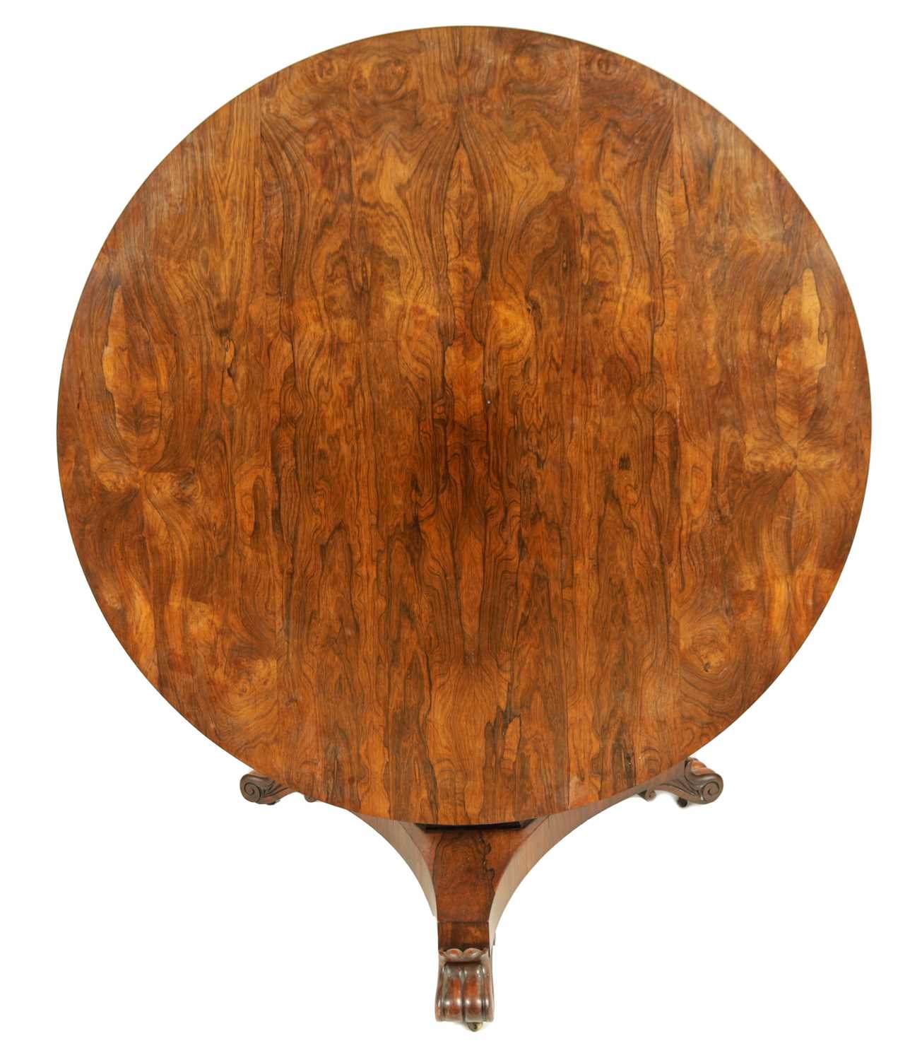 A LATE REGENCY FIGURE ROSEWOOD CIRCULAR CENTRE TABLE