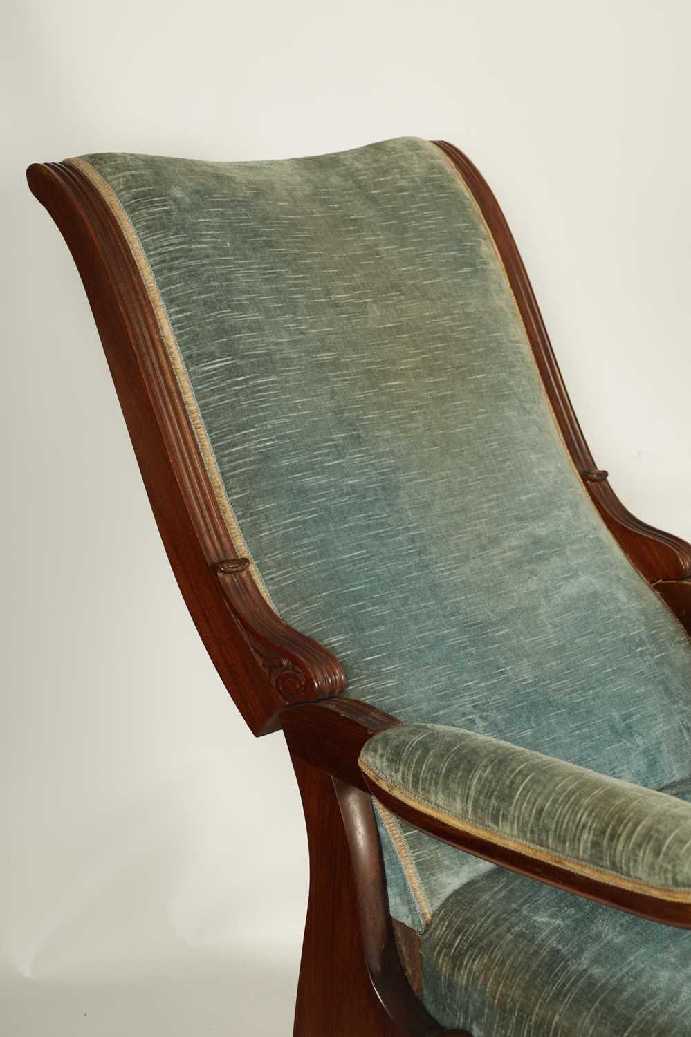 A PAIR OF LATE REGENCY UPHOLSTERED MAHOGANY RECLINING OPEN ARM CHAIRS WITH PULL-OUT ANGLED LEG RESTS - Image 5 of 12