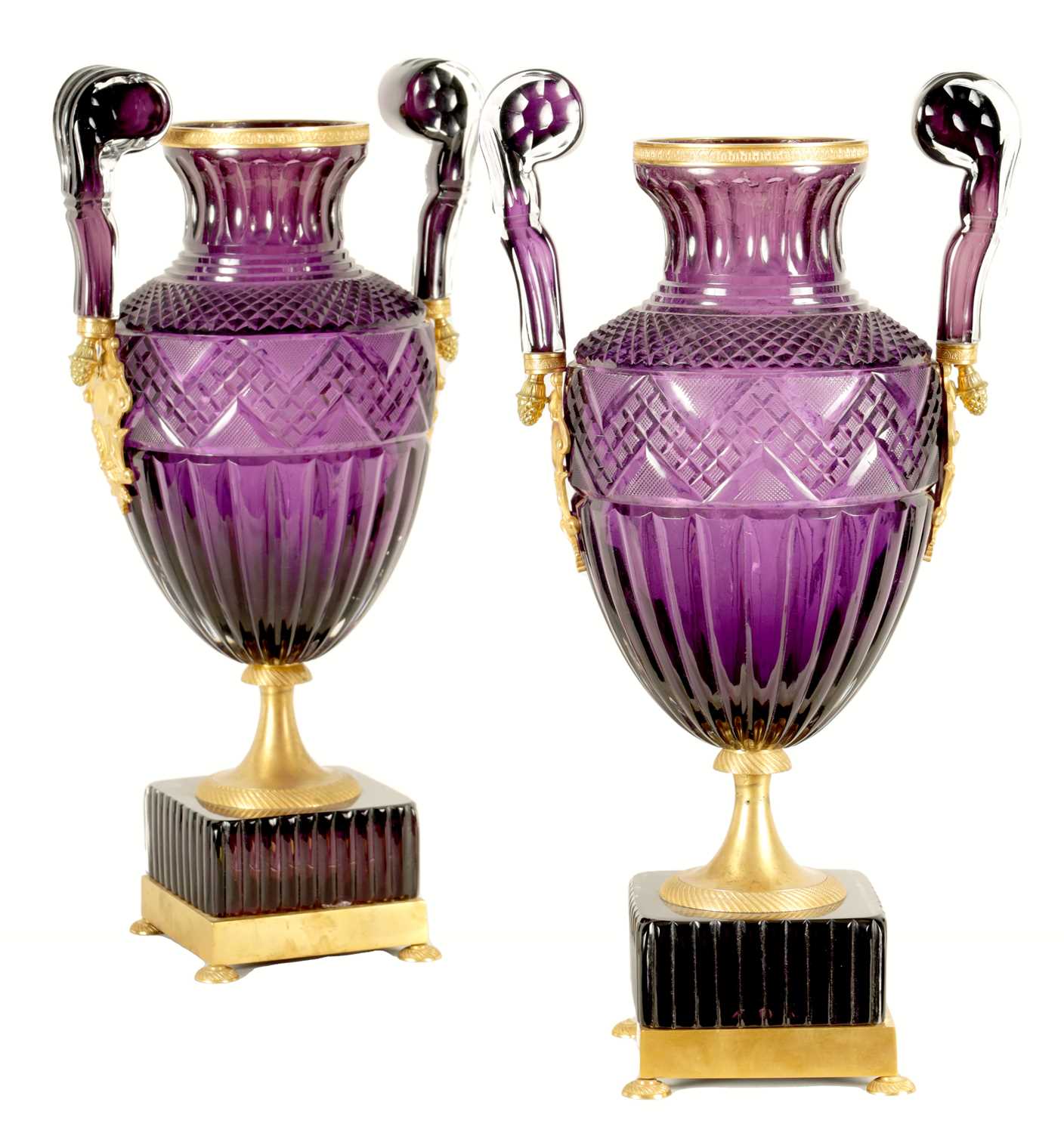 A LARGE PAIR OF LATE 19TH/EARLY 20TH CENTURY RUSSIAN ORMOLU MOUNTED AMETHYST CUT-GLASS