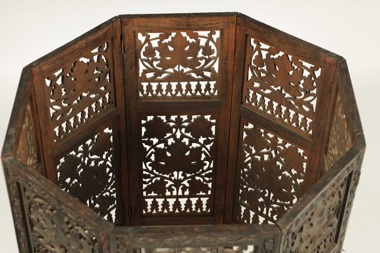 A 19TH CENTURY CARVED HARDWOOD ANGLO-INDIAN FOLDING OCCASIONAL TABLE PROBABLY BURMESE - Image 8 of 10