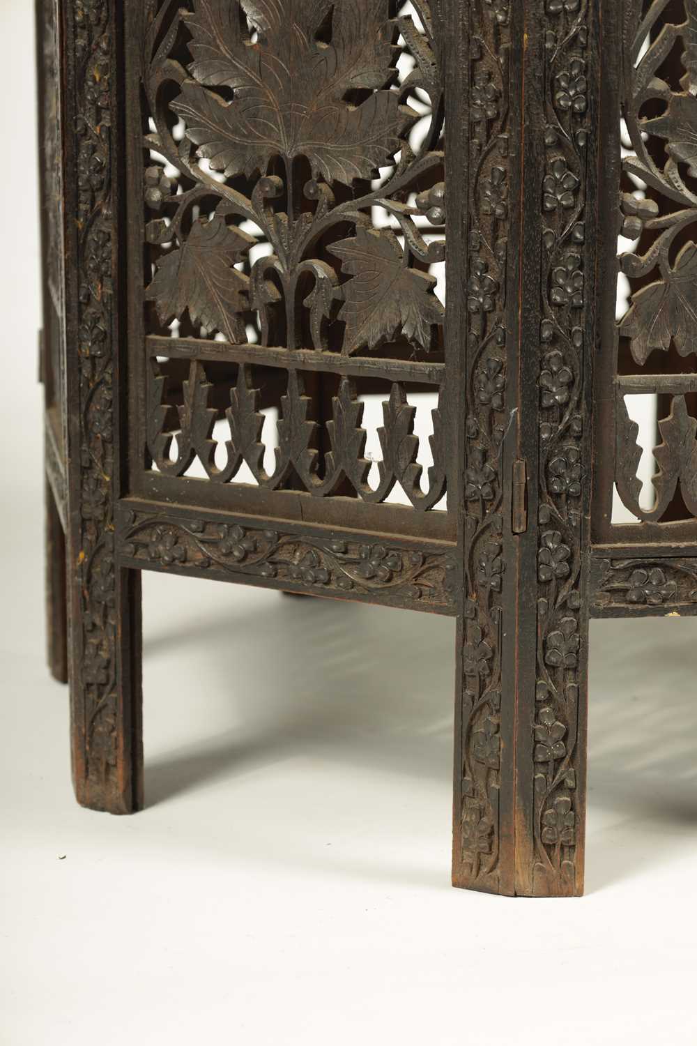 A 19TH CENTURY CARVED HARDWOOD ANGLO-INDIAN FOLDING OCCASIONAL TABLE PROBABLY BURMESE - Image 6 of 10