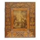 A LATE 19TH CENTURY BLACK FOREST CARVED OAK FRAME