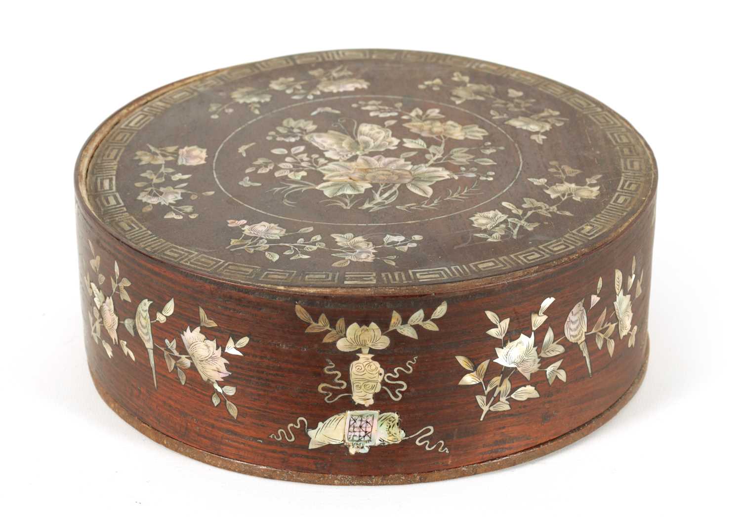 A 19TH CENTURY CHINESE HARDWOOD AND MOTHER OF PEARL INLAID CIRCULAR BOX OF LARGE SIZE