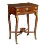 AN EARLY 19TH CENTURY ORMOLU MOUNTED FLAMED MAHOGANY FRENCH EMPIRE WRITING TABLE