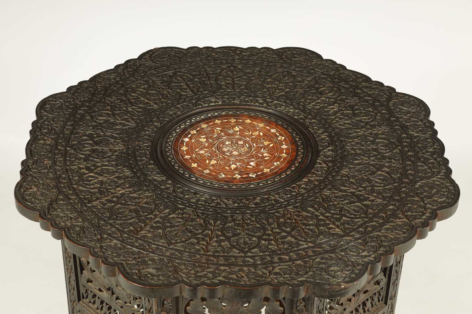 A 19TH CENTURY CARVED HARDWOOD ANGLO-INDIAN FOLDING OCCASIONAL TABLE PROBABLY BURMESE - Image 2 of 10
