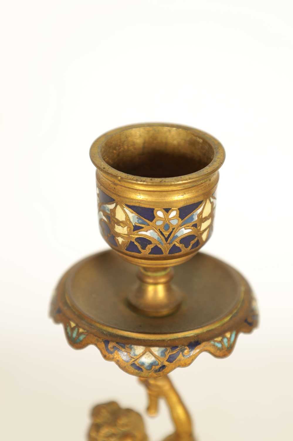 A PAIR OF 19TH CENTURY FRENCH FIGURAL GILT BRONZE AND CHAMPLEVE ENAMEL CANDLESTICKS - Image 3 of 9