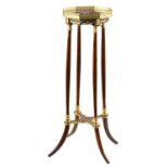 A 20TH CENTURY FRENCH GILT BRASS MOUNTED MAHOGANY OCTAGONAL JARDINIERE STAND