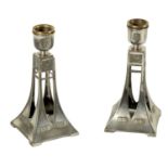 A PAIR OF EARLY 20TH CENTURY WMF SECESSIONIST SILVER PLATED CANDLESTICKS