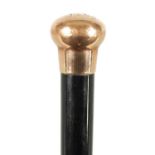 A LATE 19TH CENTURY 9CT GOLD HANDLED WALKING STICK