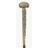 A LATE 19TH CENTURY CHINESE SILVER MOUNTED RHINOCEROS HORN WALKING CANE