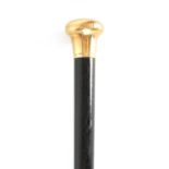 A LATE 19TH CENTURY 9CT GOLD HANDLED WALKING STICK