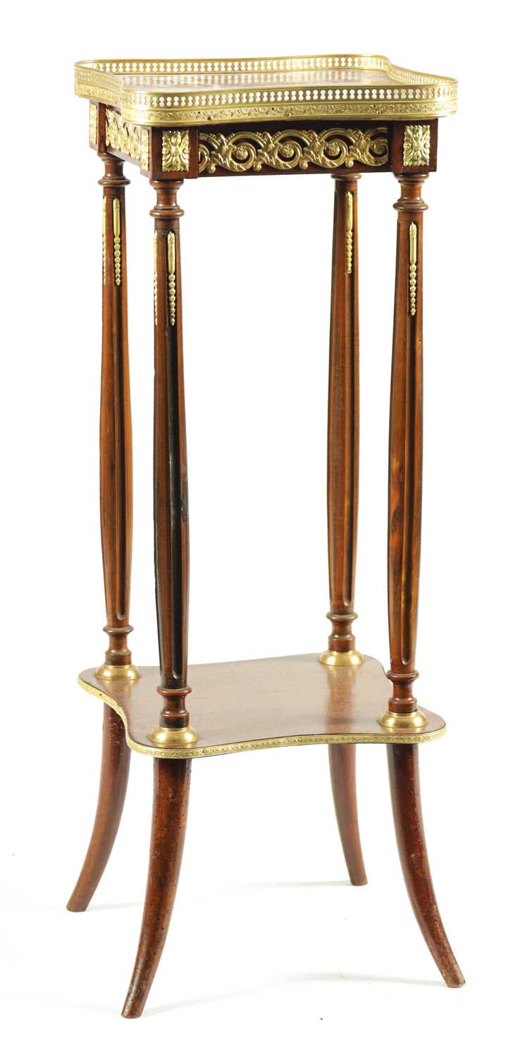 A 20TH CENTURY FRENCH GILT BRASS MOUNTED MAHOGANY SHAPED JARDINIERE STAND
