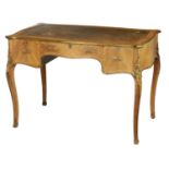 MAPLES & CO. LONDON. A 19TH CENTURY LOUIS XVI STYLE ORMOLU MOUNTED KINGWOOD SERPENTINE DESK