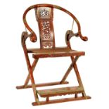 A 19TH CENTURY HORSESHOE BACK FOLDING HUNTING CHAIR POSSIBLY HUANGHUALI