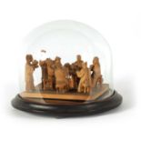 A 19TH CENTURY CHINESE BOXWOOD CARVED FIGURE GROUP UNDER GLASS DOME