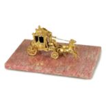 A 19TH CENTURY FRENCH SILVER GILT MODEL OF A COACH AND HORSES WITH RIDER