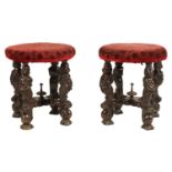 A GOOD PAIR OF CHARLES II CARVED WALNUT CIRCULAR UPHOLSTERED STOOLS