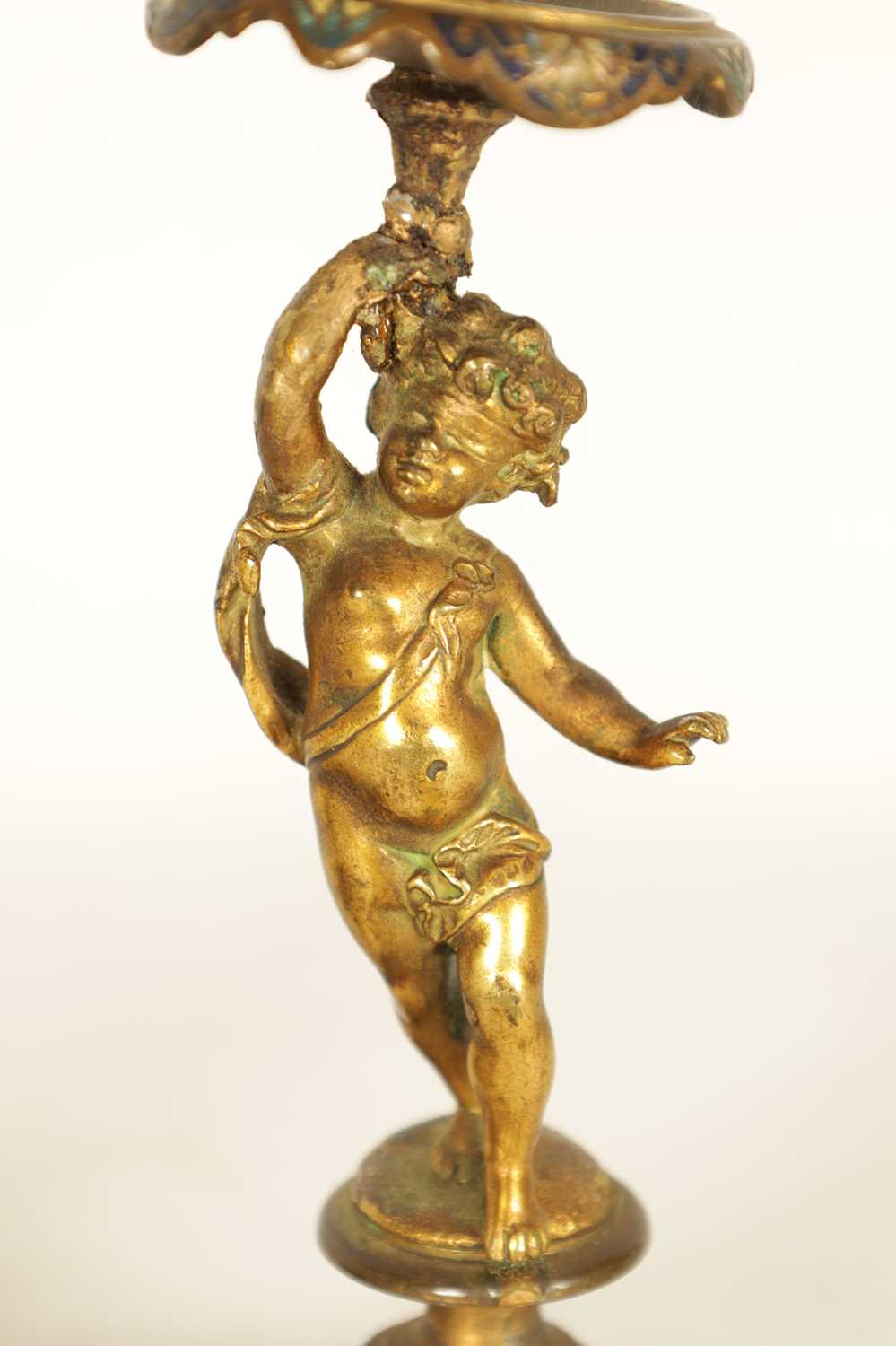 A PAIR OF 19TH CENTURY FRENCH FIGURAL GILT BRONZE AND CHAMPLEVE ENAMEL CANDLESTICKS - Image 5 of 9