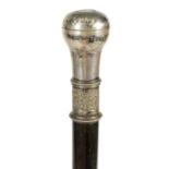 A LATE 19TH CENTURY CONTINENTAL SILVER METAL MOUNTED EBONISED WALKING CANE