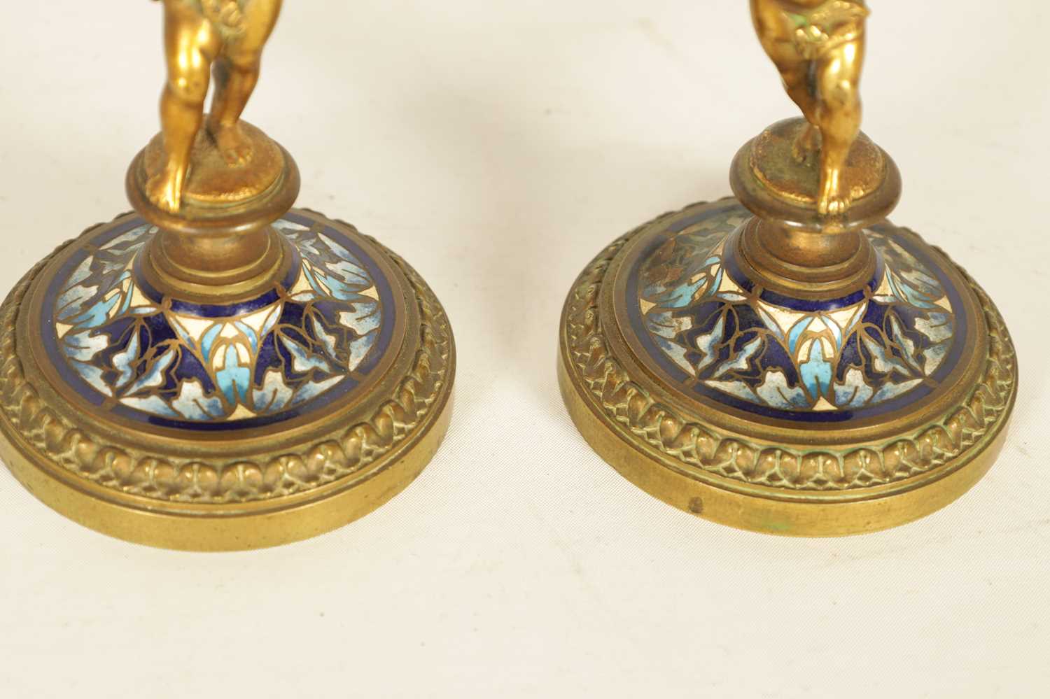 A PAIR OF 19TH CENTURY FRENCH FIGURAL GILT BRONZE AND CHAMPLEVE ENAMEL CANDLESTICKS - Image 7 of 9