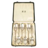 A FINE SET OF GEORGE V SILVER LIBERTY & CO. TEASPOONS IN ORIGINAL FITTED CASE