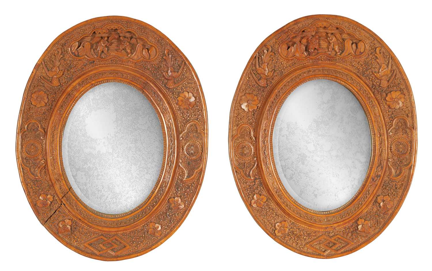 A PAIR OF LATE 19TH CENTURY CHINESE CARVED BOXWOOD OVAL MIRRORS