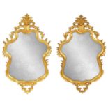 A PAIR OF 18TH/EARLY 19TH CENTURY FRENCH ROCOCO GILT GESSO HANGING MIRRORS
