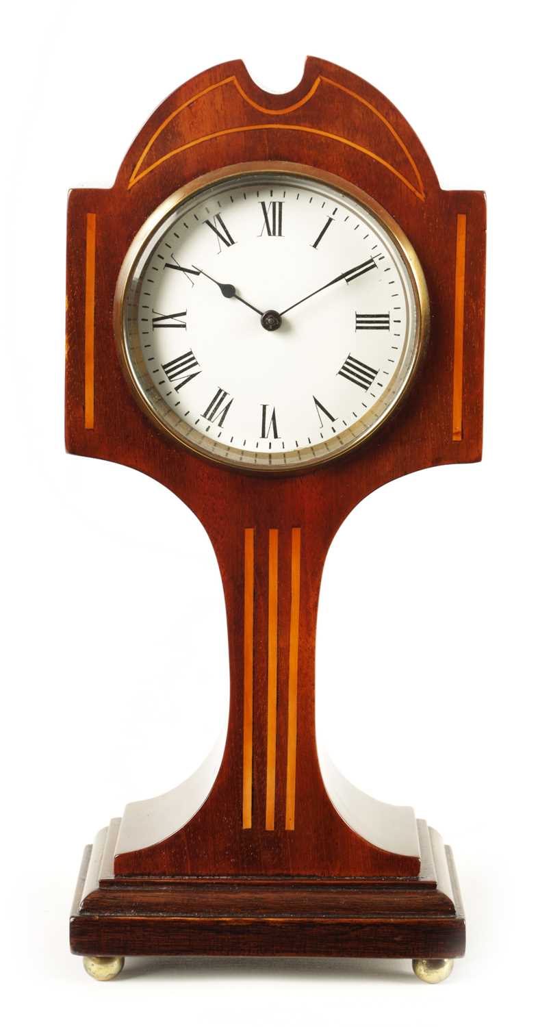 AN EDWARDIAN ART NOUVEAU STYLE BOXWOOD STRUNG AND MAHOGANY INLAID MANTEL CLOCK