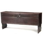 A 17TH CENTURY OAK PLANK COFFER/SWORD BOX OF LARGE SIZE