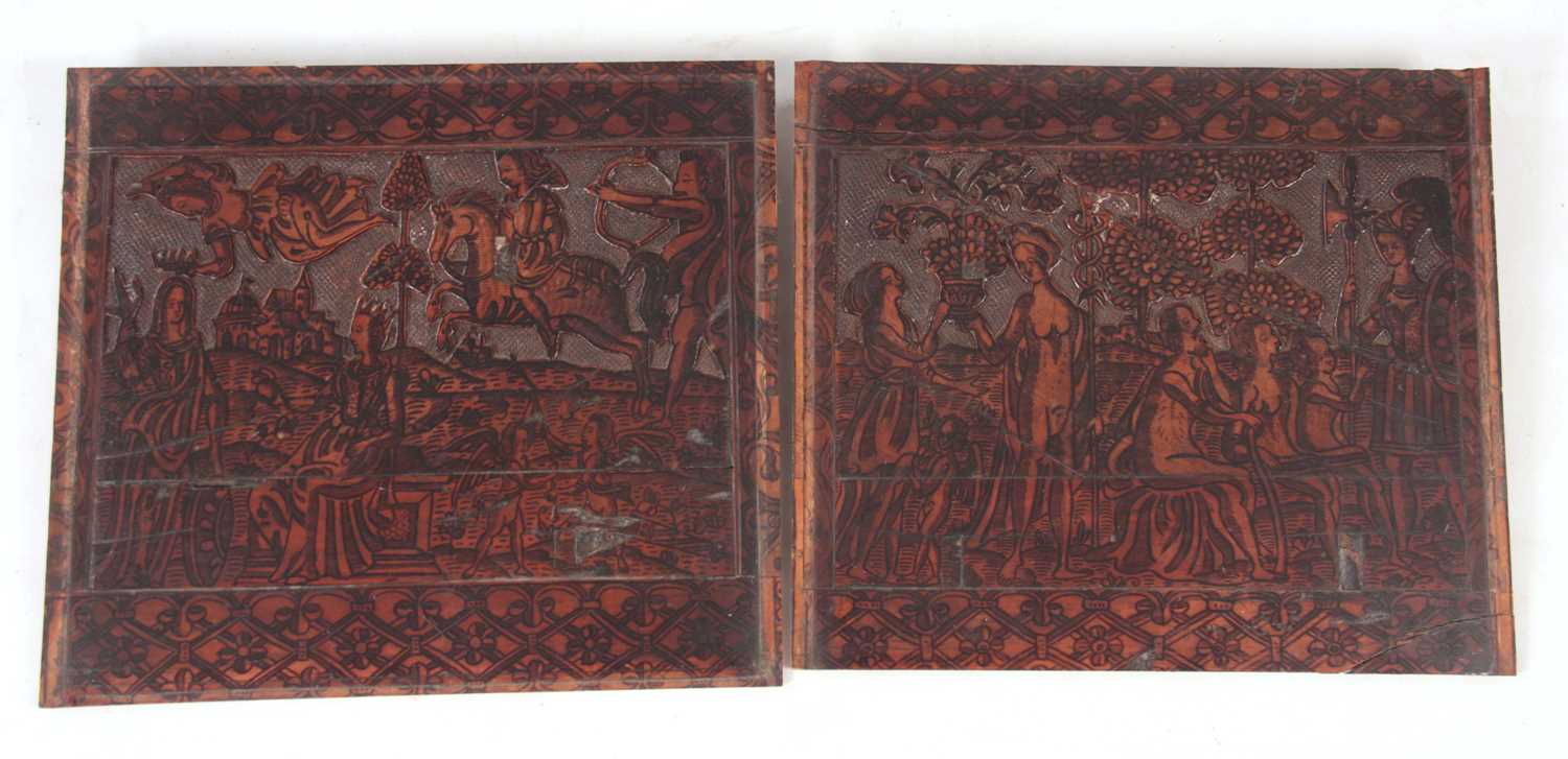 AN INTERESTING PAIR OF 16TH CENTURY ITALIAN CARVED AND INK WORK FRUITWOOD PANELS