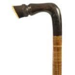 A LATE 19TH CENTURY CONTINENTAL TWISTED SEGMENTED HORN HOOF HANDLE WALKING STICK