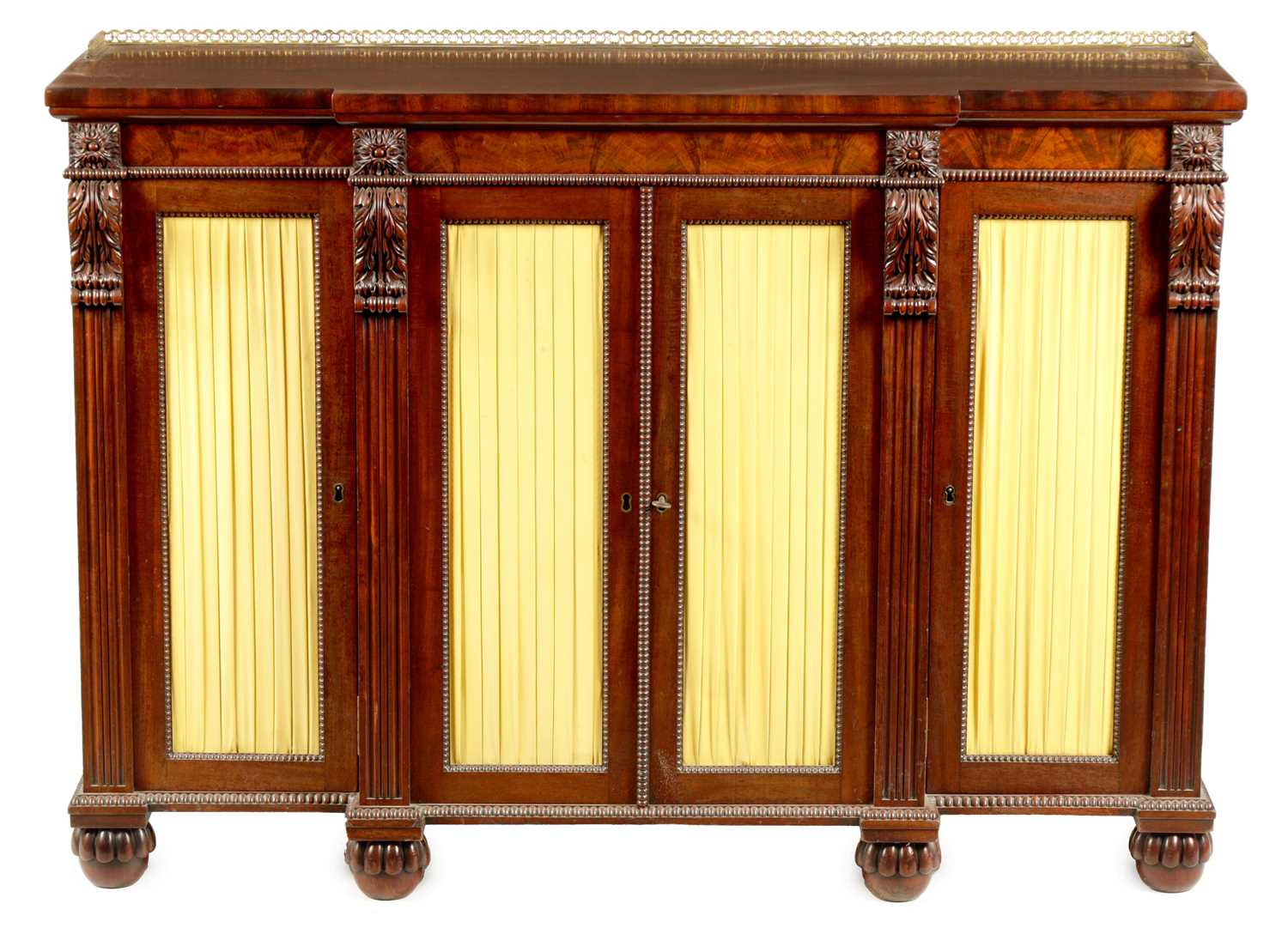 A FINE WILLIAM IV MAHOGANY BREAKFRONT SIDE CABINET IN THE MANNER OF GILLOWS