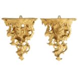 A PAIR OF EARLY GEORGE III CARVED GILTWOOD WALL BRACKETS