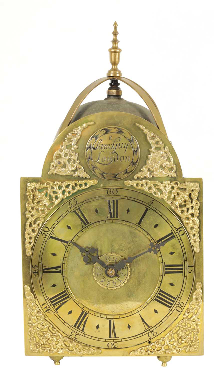 SAMUEL GUY, LONDON. AN EARLY 18TH CENTURY BRASS LANTERN CLOCK