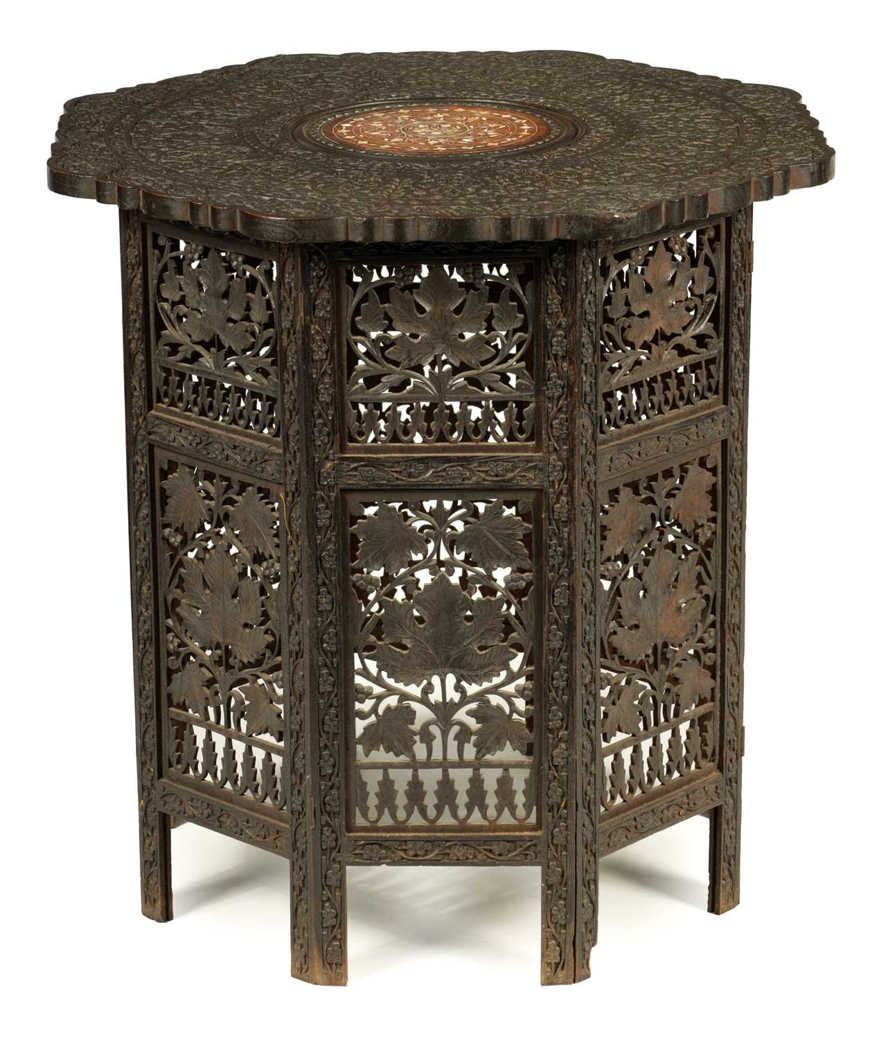 A 19TH CENTURY CARVED HARDWOOD ANGLO-INDIAN FOLDING OCCASIONAL TABLE PROBABLY BURMESE