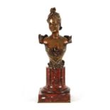 MAURICE MAIGNAN. A FRENCH BRONZE AND ROUGE MARBLE BUST CIRCA 1900