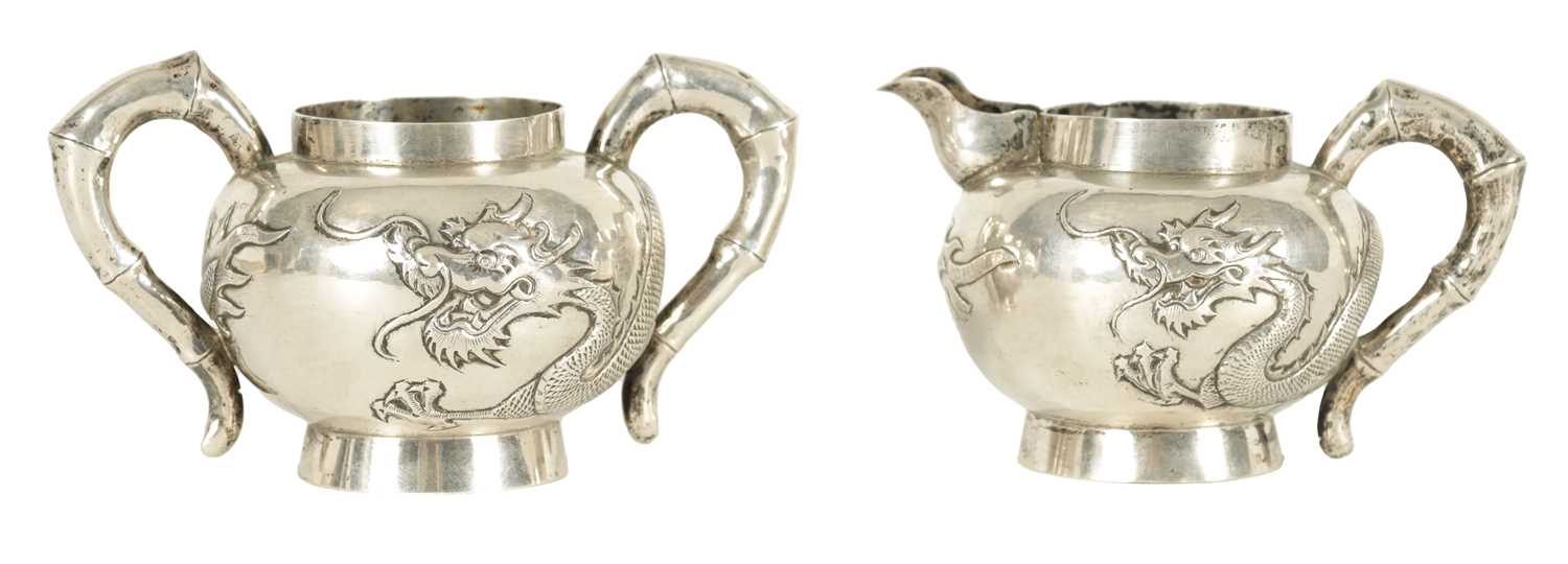 A 19TH CENTURY CHINESE SILVER CREAM JUG AND SUGAR BOWL