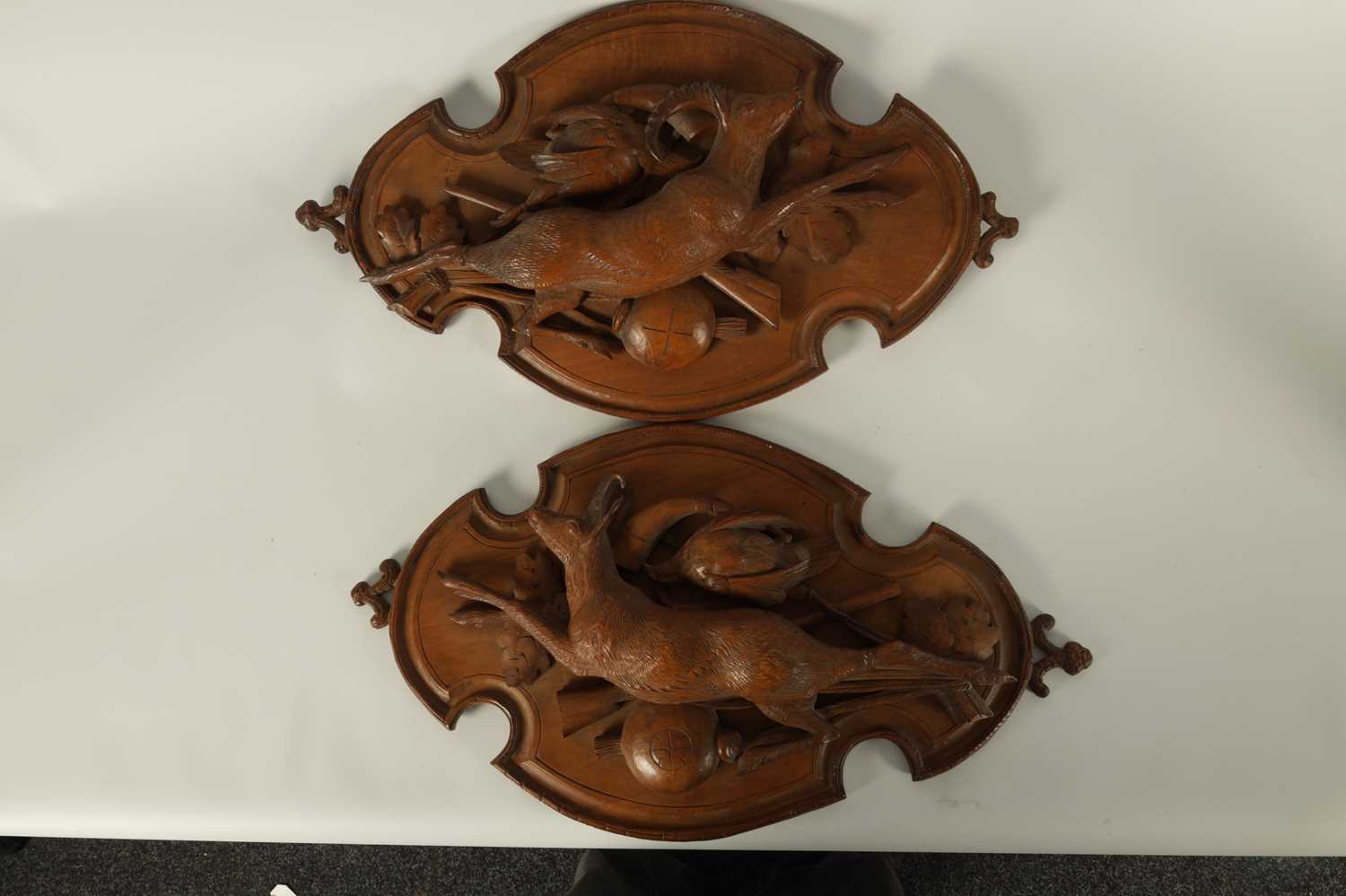 A PAIR OF LATE 19TH CENTURY BLACK FOREST CARVED LINDEN WOOD PLAQUES - Image 3 of 5