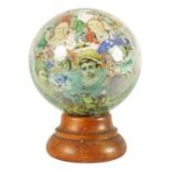 A RARE 19TH CENTURY DECALCOMANIA GLASS GLOBE