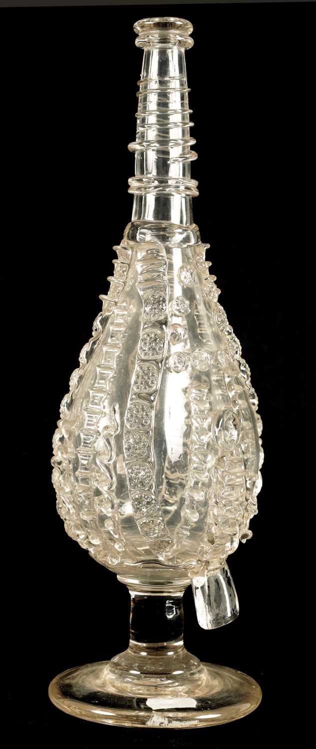 AN 18TH CENTURY LARGE TAPERING CLEAR GLASS FLASK