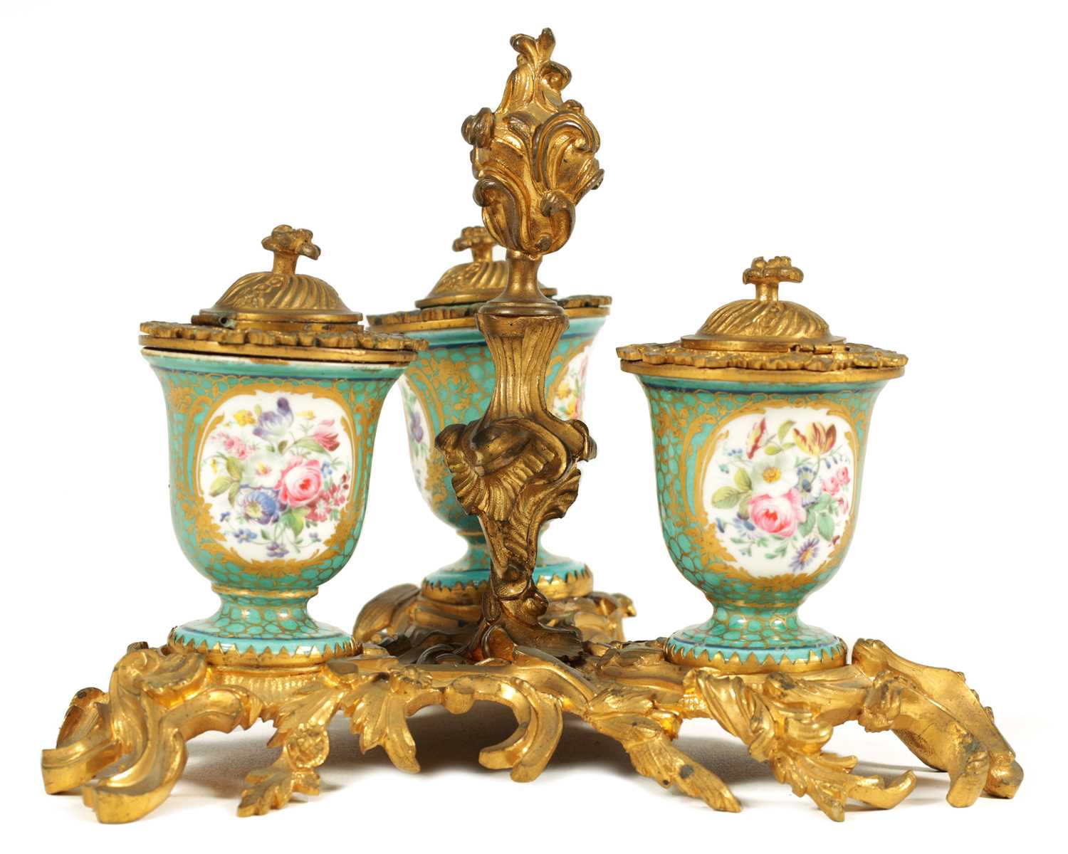 A 18TH CENTURY FRENCH ROCOCO ORMOLU AND SERVES STYLE TRIPLE INKSTAND