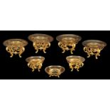 FERDINAND BARBEDIENNE. AN UNUSUAL SET OF EIGHT 19TH CENTURY ORMOLU TABLE COMPORTS