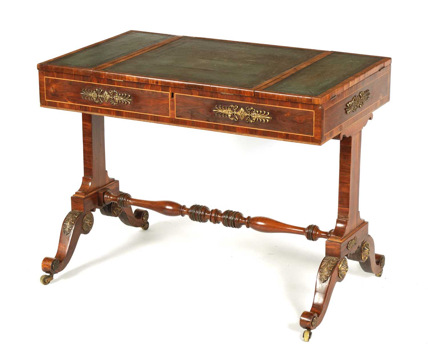 A REGENCY ORMOLU MOUNTED ROSEWOOD WRITING TABLE